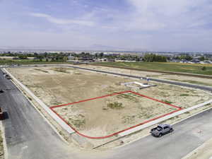 Birds eye view of property with a mountain view