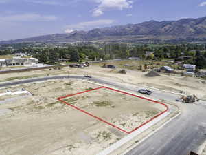 Birds eye view of property with a mountain view