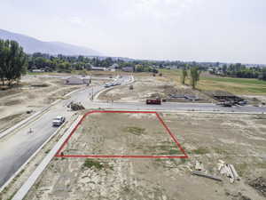 Birds eye view of property with a mountain view