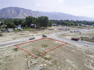 Birds eye view of property with a mountain view