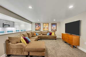 Living room with light colored carpet