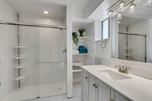 Primary Bathroom with sliding shower door.