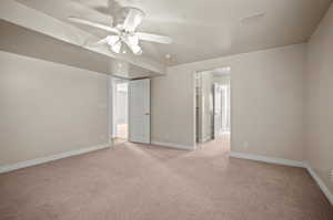 3rd Bedroom with Jack and Jill attached bathroom.  ceiling fan and light carpet