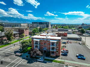 Birds eye view of property with a mountain view