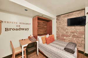 Bedroom featuring hardwood / wood-style floors