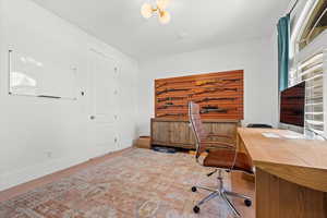 Home office featuring wood-type flooring