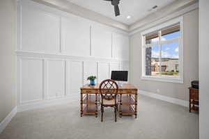 Office featuring ceiling fan, light carpet, and a healthy amount of sunlight