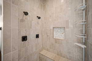 Bathroom with tiled shower