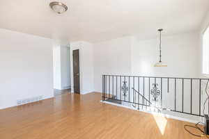 Unfurnished room featuring light hardwood / wood-style flooring