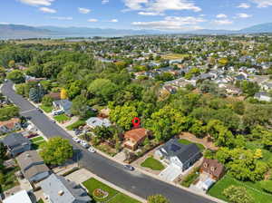 Birds eye view of property with a mountain view