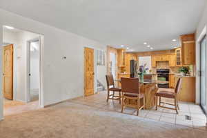 View of carpeted dining space