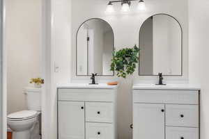 Bathroom with toilet and vanity