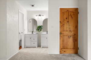 Bathroom with toilet and vanity