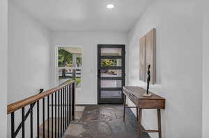 Foyer featuring a textured ceiling