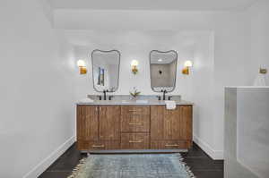 Bathroom featuring vanity and tile patterned flooring