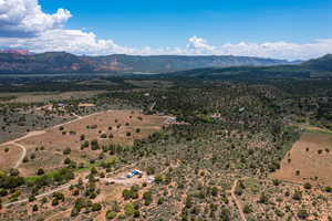 Birds eye view of property featuring a mountain view