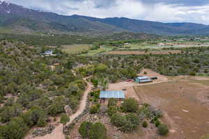 Drone / aerial view featuring a mountain view