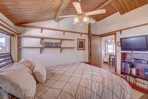 Bedroom with wood ceiling, ceiling fan, light wood-type flooring, and vaulted ceiling with beams