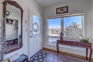 Foyer entrance featuring plenty of natural light