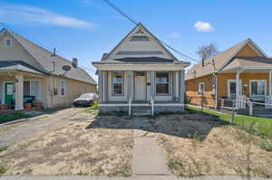 Bungalow featuring covered porch