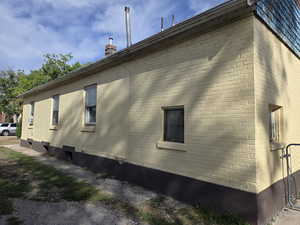 South side of house along driveway.