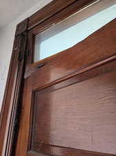 Original door & transom window w/ hardware.