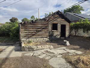 The carriage house/shed/chicken coop.