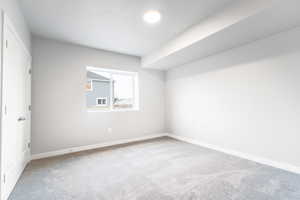 Empty room with light carpet