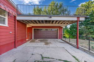 Garage featuring wood walls