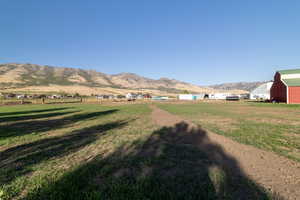 Property view of mountains featuring a rural view