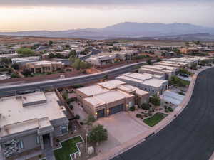 Aerial view at dusk featuring a mountain view