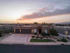 View of front of property with a garage