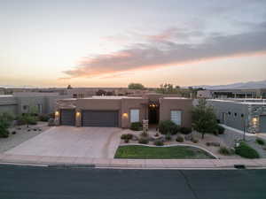 View of front of property with a garage