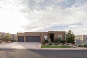 Adobe home with a garage