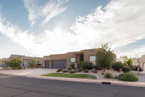 Southwest-style home with a garage