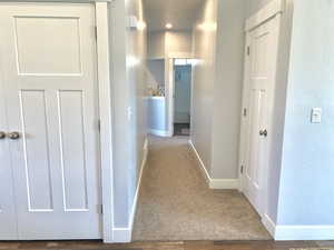 Oversized hallway with decorative alcove.