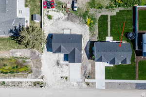 Aerial view of the home above it.  New grass established.  2024.