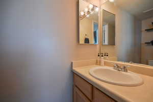 Bathroom featuring toilet and vanity