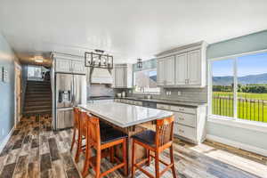 Kitchen featuring a healthy amount of sunlight and stainless steel appliances