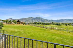 View of mountain feature with a rural view