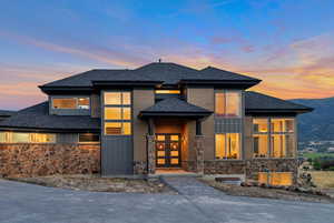 Prairie-style home featuring french doors