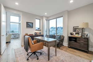 Home office featuring light wood-type flooring