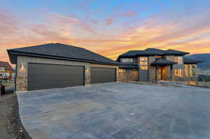 Prairie-style house with a garage