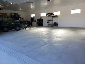 Garage featuring a garage door opener