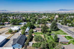 Birds eye view of property with a mountain view