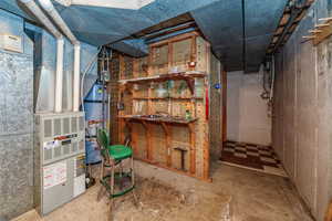 Basement featuring water heater