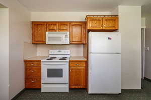 Kitchen with white appliances