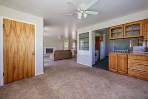 Interior space with ceiling fan and sink