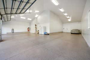 Tandem Depth Garage with vaulted ceilings and epoxy flooring