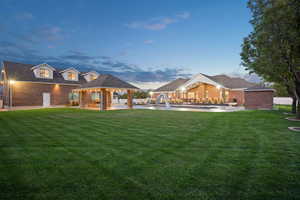 Back Yard at dusk with a patio area